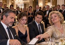 When my daughter’s future mother-in-law pushed a $14,870 dinner bill toward me, she smiled and said, “If you want your daughter welcomed into my family, prove you can pay.” Thirty people watched as she added, “Or can’t you afford it?” I reached for my wallet without saying a word. Then the waiter leaned close and whispered, “Mr. Hayes… don’t pay this bill. You need to come with me. Now.”