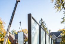 “Checking back into our master suite for cashmere blazers, I heard crystal laughter and my husband Mark murmuring: ‘She’s checked into a downtown hotel for a week.’ I didn’t break the door or scream. I called our private equity broker from the driveway: ‘Buy lot 412 next door, wire-closed today.’ Seventy-two hours later, Mark’s phone flashed my real-time driveway feed as I texted: ‘Look out your glass slider, darling.'”