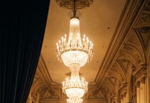 “While I suffocated in the dark wine cellar, tied and gagged, my husband’s associate wore my gown to steal my identity at the contract signing. She thought she had won. Then, a crystal glass shattered, freezing the room. My brother’s voice pierced the silence: “Didn’t your wife ever mention she has a brother? Who gave you the nerve to impersonate my sister?” But little do they know, breaking this door down is only the beginning of my revenge…”
